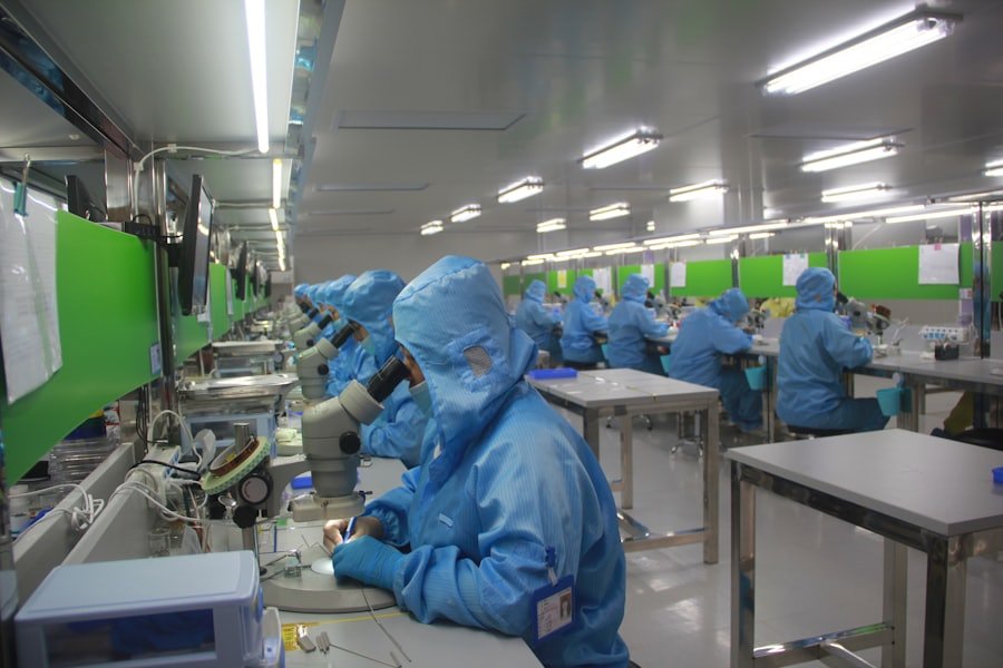 Quality inspectors checking products under microscopes